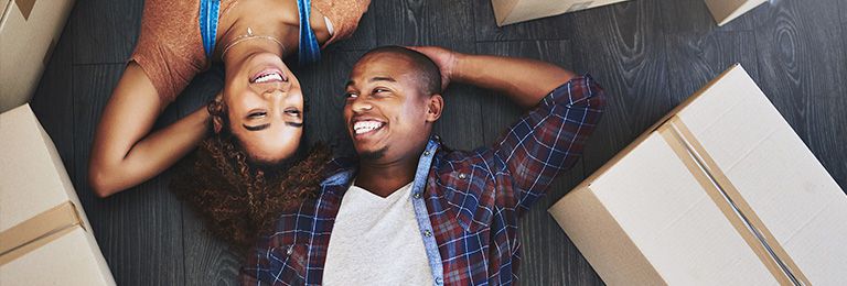 Couple lying on floor