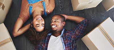 Couple lying on floor