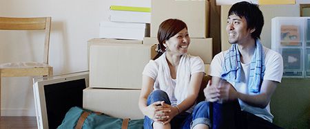 Couple sitting on floor