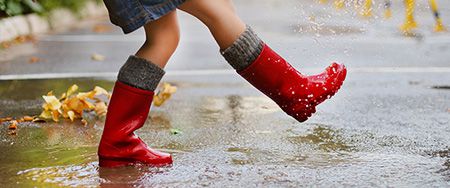 Red rain boots.