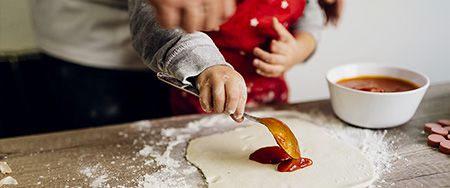 preparing pizza together